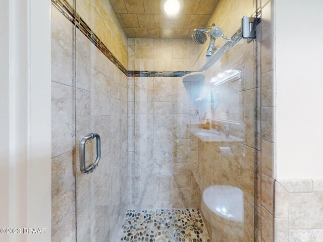520 S Peninsula Ave Unit 2D7, New Smyrna Beach, FL 32169 - bathroom featuring an enclosed shower