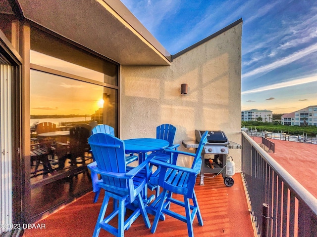 520 S Peninsula Ave Unit 2D7, New Smyrna Beach, FL 32169 - balcony at dusk featuring area for grilling