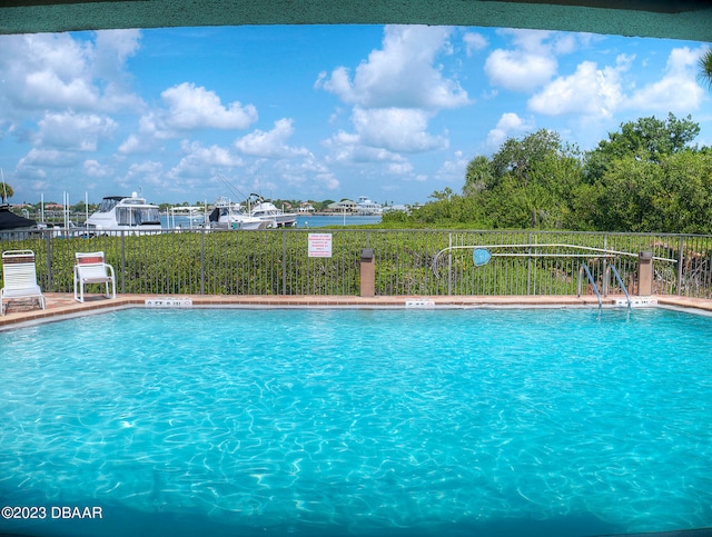 520 S Peninsula Ave Unit 2D7, New Smyrna Beach, FL 32169 - view of pool with a water view