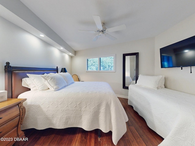 520 S Peninsula Ave Unit 2D7, New Smyrna Beach, FL 32169 - bedroom with ceiling fan and dark hardwood / wood-style floors