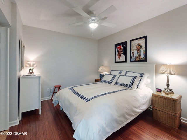 520 S Peninsula Ave Unit 2D7, New Smyrna Beach, FL 32169 - bedroom with ceiling fan and dark hardwood / wood-style flooring