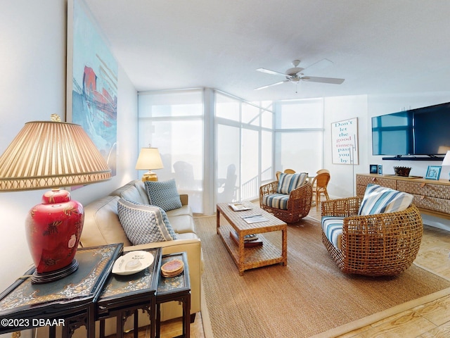 520 S Peninsula Ave Unit 2D7, New Smyrna Beach, FL 32169 - living room with expansive windows, wood-type flooring, and ceiling fan