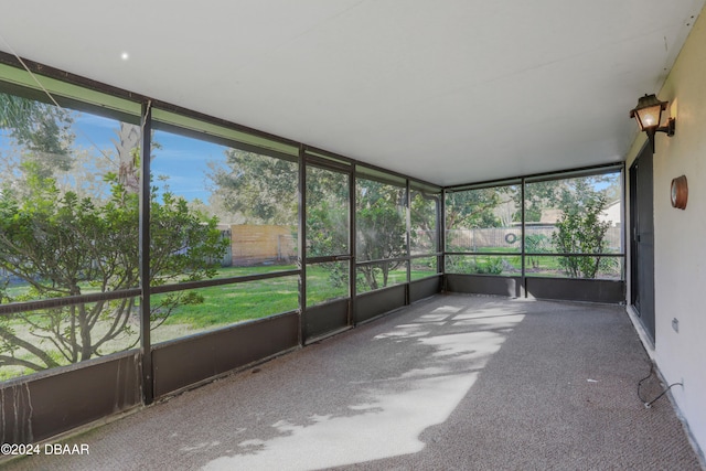 unfurnished sunroom featuring a healthy amount of sunlight