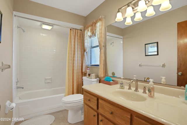 full bathroom featuring vanity, shower / bath combo with shower curtain, tile patterned floors, and toilet