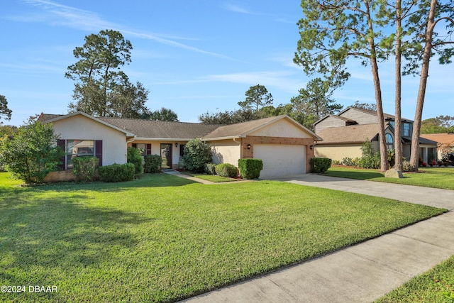 ranch-style home featuring a garage and a front yard