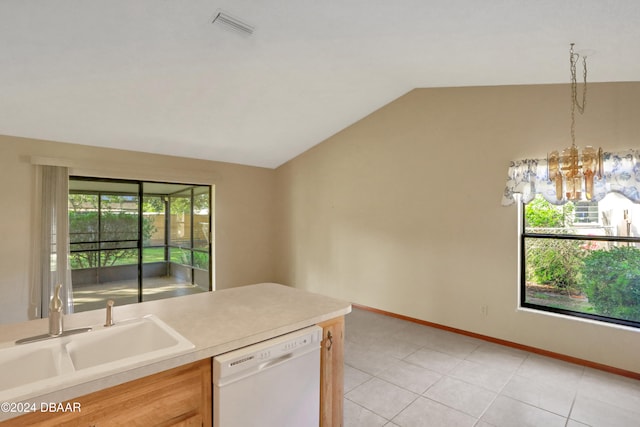 kitchen with white dishwasher, vaulted ceiling, a chandelier, sink, and light tile patterned floors