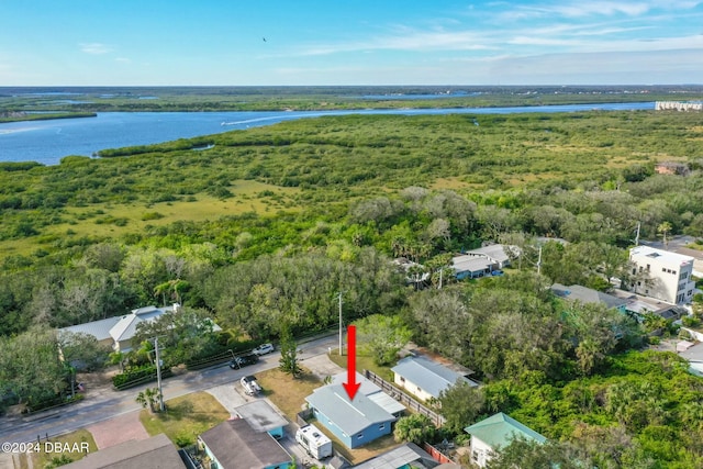 bird's eye view with a water view