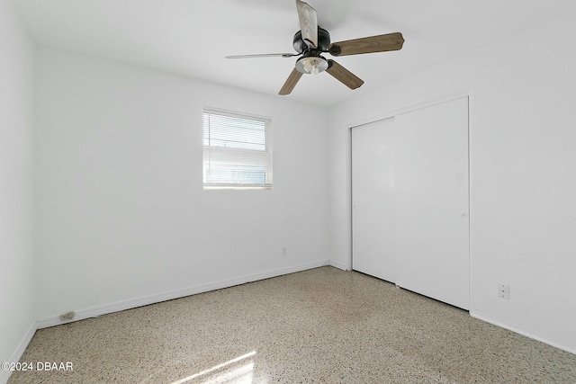 unfurnished room with ceiling fan