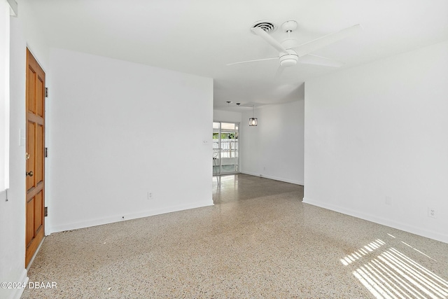 empty room featuring ceiling fan