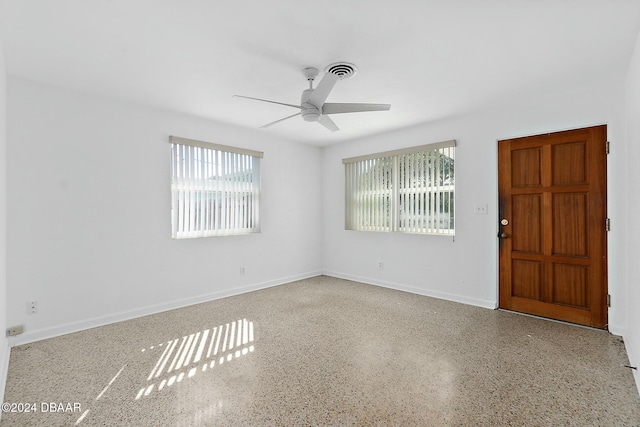 empty room featuring ceiling fan