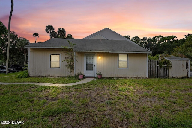 view of front of property with a yard