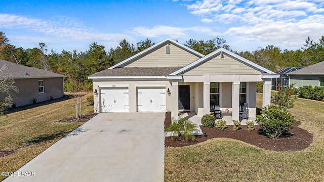 view of front of house with a shingled roof, concrete driveway, a porch, an attached garage, and a front lawn