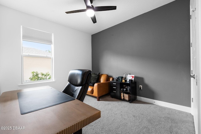 office area featuring carpet flooring, ceiling fan, and baseboards