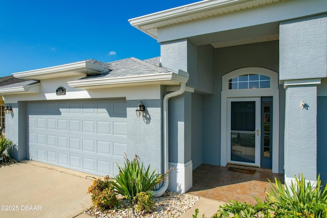 entrance to property featuring a garage