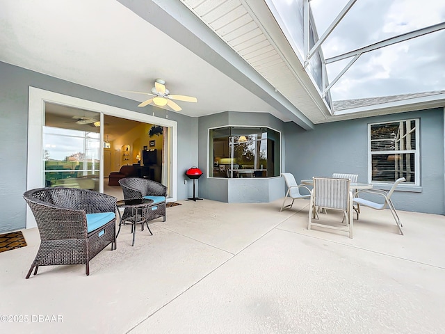 view of patio featuring ceiling fan