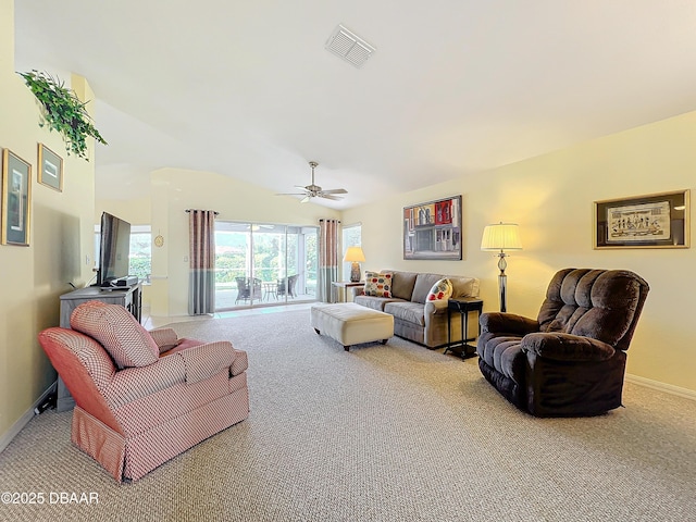 living room featuring ceiling fan and light colored carpet