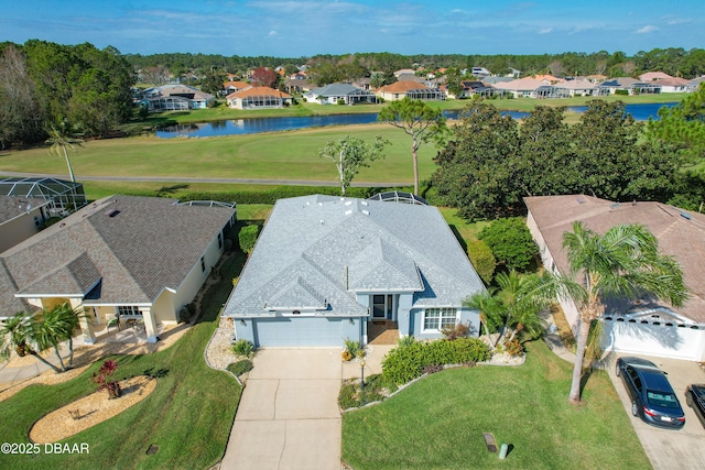 drone / aerial view with a water view