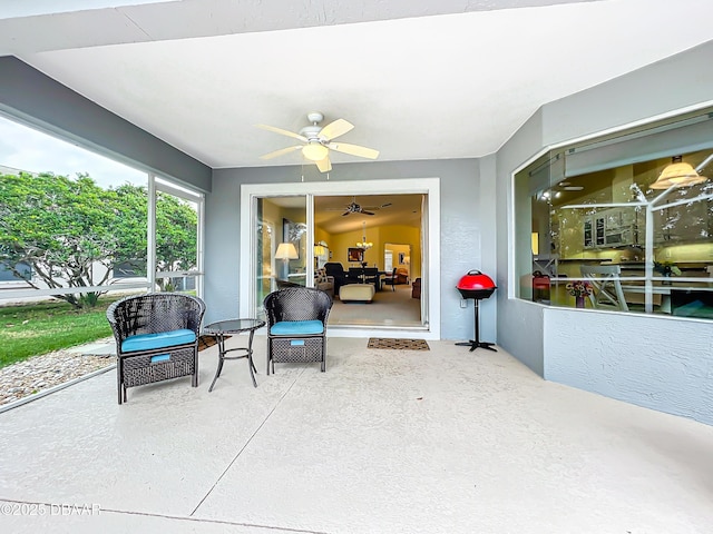 view of patio featuring ceiling fan