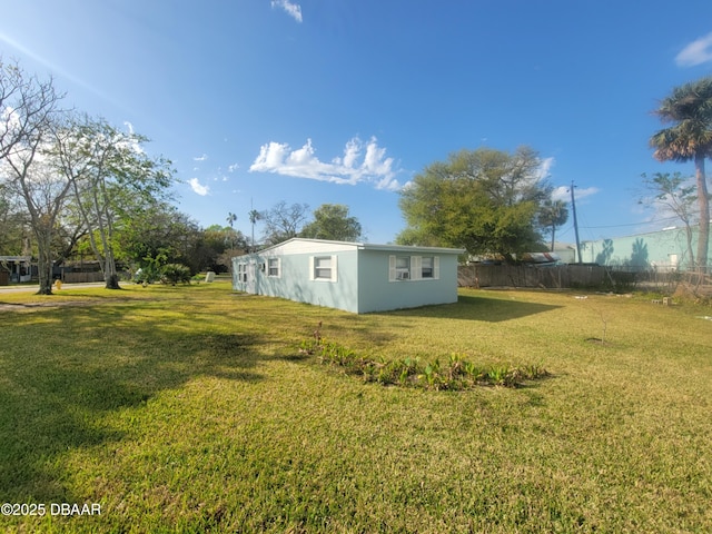 view of yard with fence