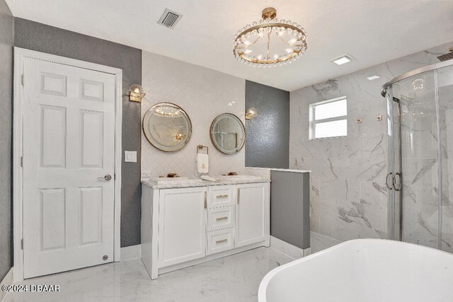 bathroom with a chandelier, vanity, and plus walk in shower