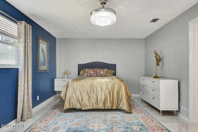 bedroom with a textured ceiling