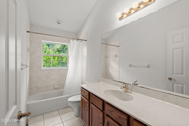 full bathroom featuring toilet, shower / tub combo with curtain, vanity, and tile patterned floors