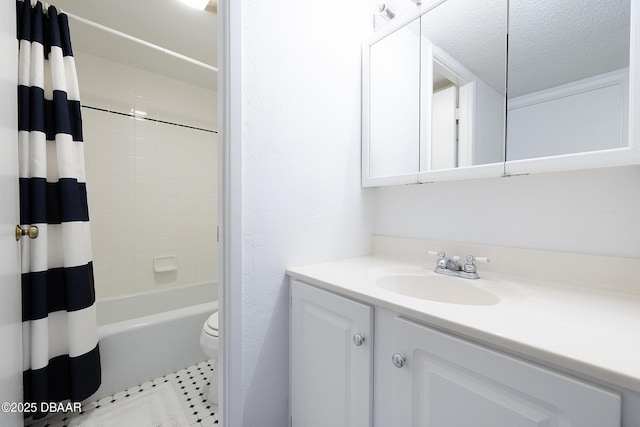 full bath with toilet, tile patterned floors, shower / bath combo with shower curtain, a textured ceiling, and vanity