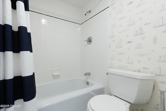 bathroom featuring shower / bathtub combination with curtain, toilet, and wallpapered walls