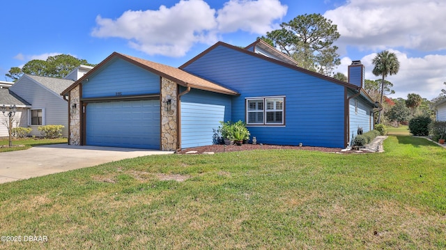 view of front of home featuring a garage and a front lawn