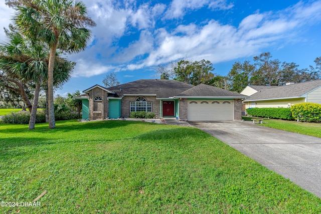 single story home with a garage and a front lawn