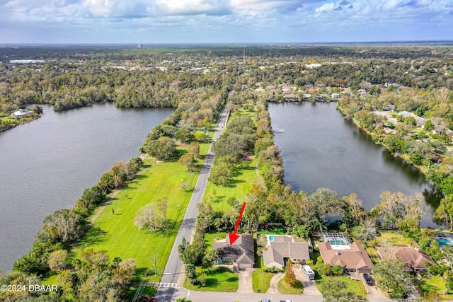 birds eye view of property featuring a water view