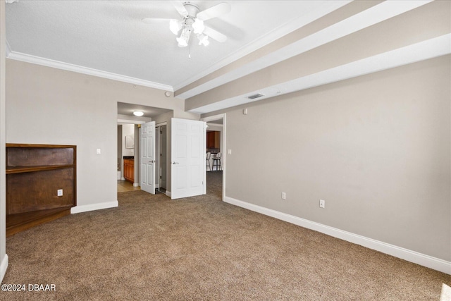 interior space featuring ceiling fan and crown molding