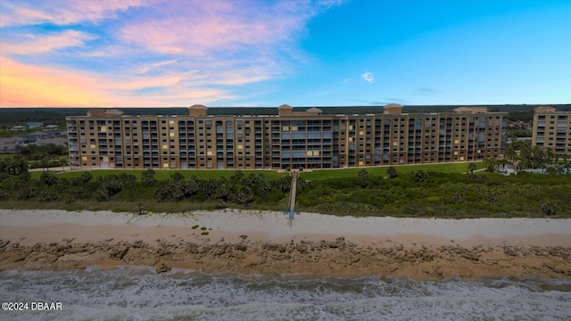 outdoor building at dusk with a water view