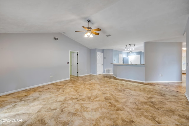 20 Potters Ln, Palm Coast, FL 32164 - unfurnished living room featuring a ceiling fan, lofted ceiling, and baseboards