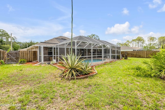 20 Potters Ln, Palm Coast, FL 32164 - rear view of house with a lanai and a gate