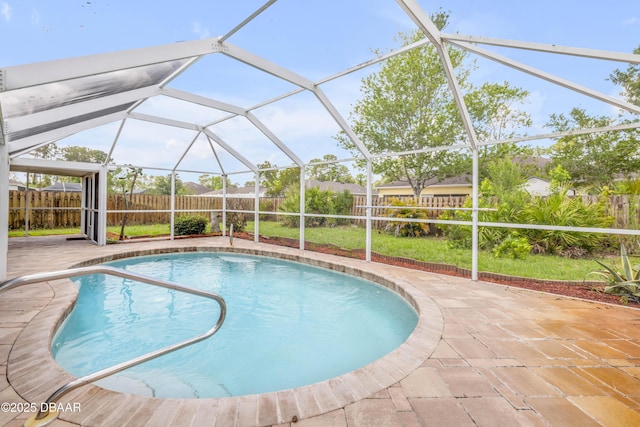 20 Potters Ln, Palm Coast, FL 32164 - view of swimming pool featuring a fenced backyard, a patio, and glass enclosure