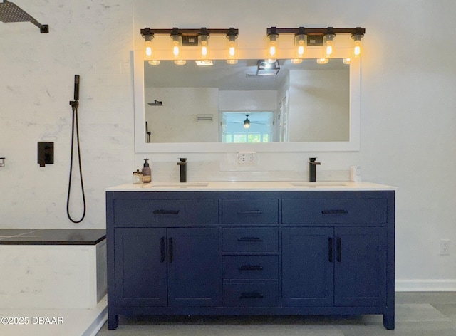 full bathroom with a sink, ceiling fan, and a shower
