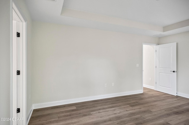 empty room featuring dark hardwood / wood-style floors