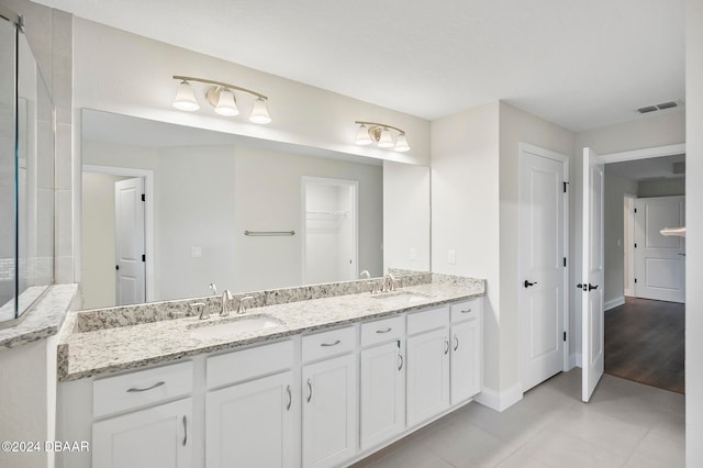 bathroom with vanity and hardwood / wood-style flooring