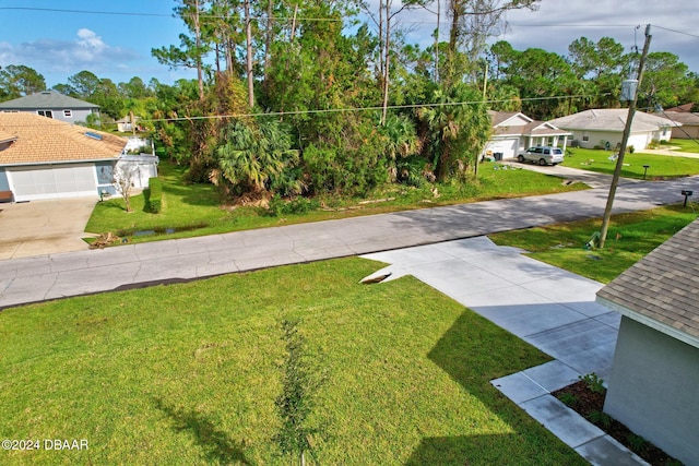 view of yard with a garage