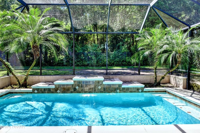 outdoor pool featuring a lanai