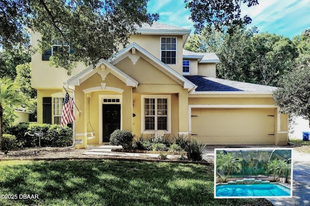 view of front of property featuring a front yard, roof with shingles, an attached garage, and stucco siding