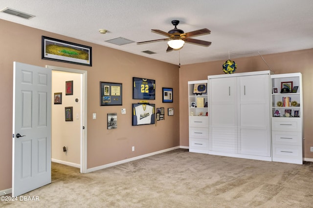 unfurnished bedroom with baseboards, visible vents, and carpet flooring