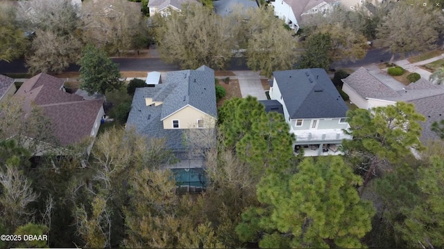 birds eye view of property with a residential view