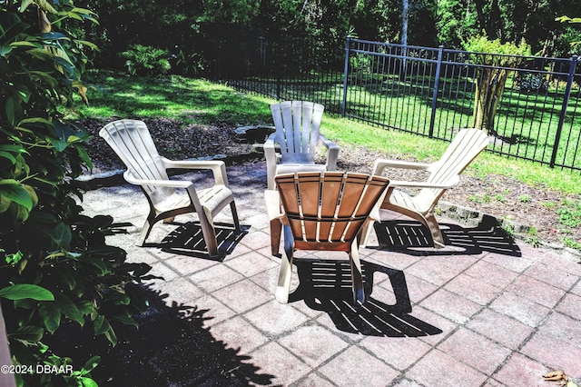 view of patio featuring fence