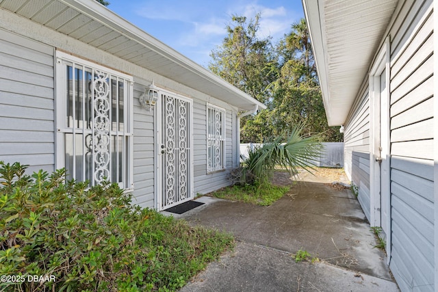 property entrance with a patio area