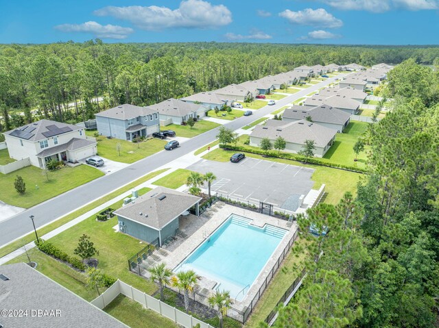 350 Sunset Point Dr, Ormond Beach, FL 32174 - aerial perspective of suburban area with a forest and a pool