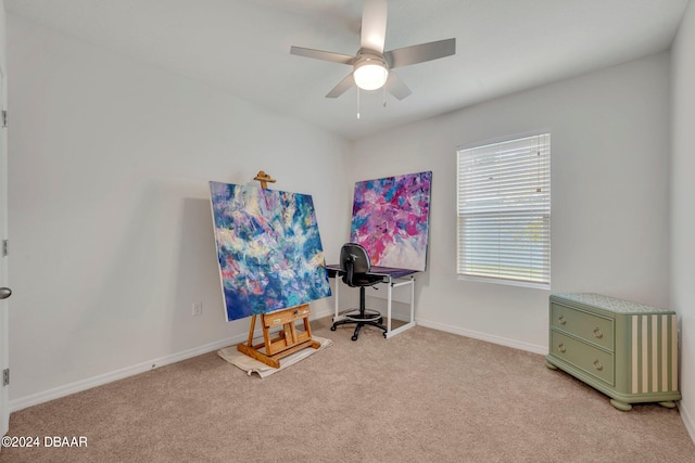 misc room with ceiling fan and light carpet