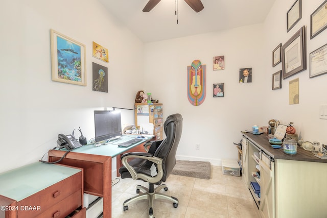 office space with ceiling fan and light tile patterned floors