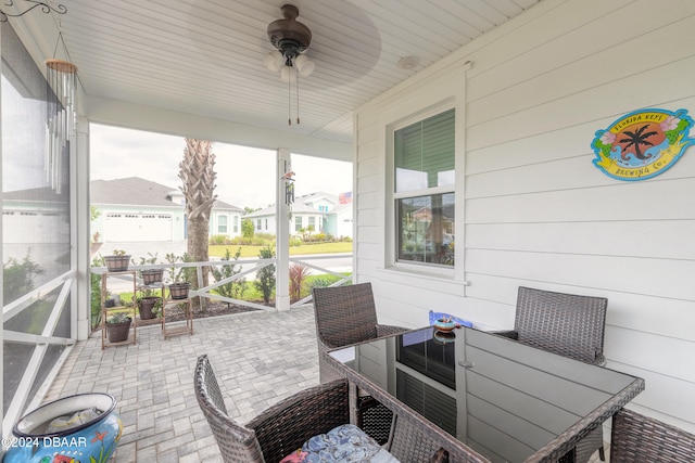 sunroom featuring wooden ceiling